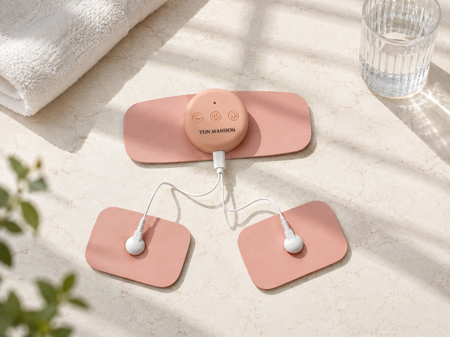 YUN MANSION Core postpartum recovery device on marble table